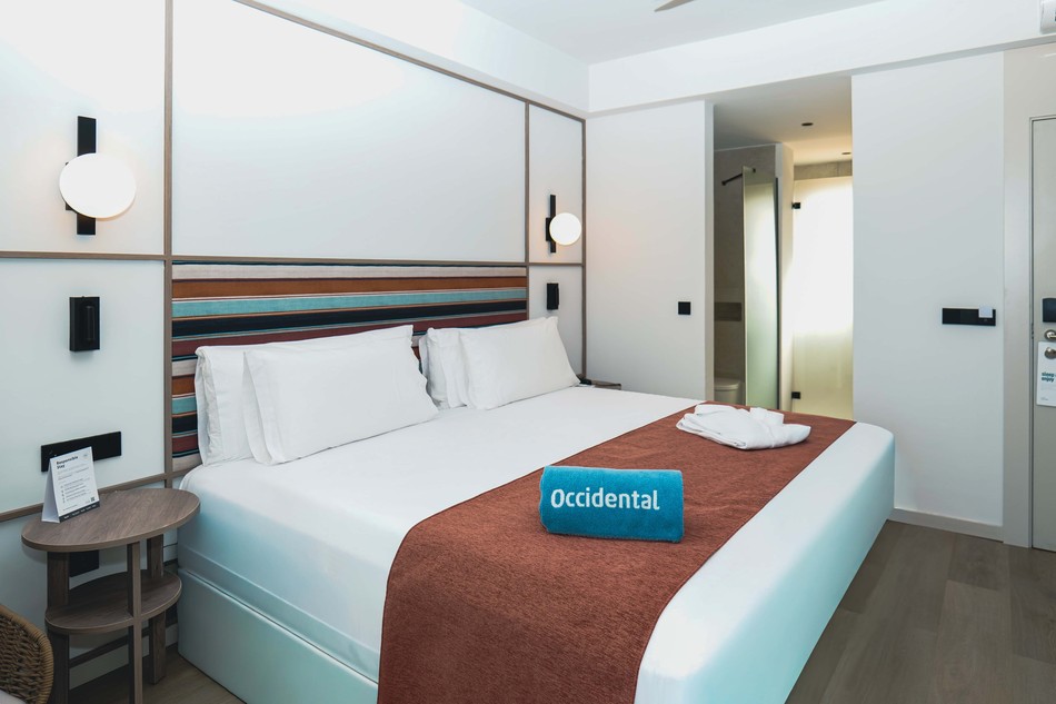 Dormitorio de la habitación Deluxe del Occidental Boa Vista Beach